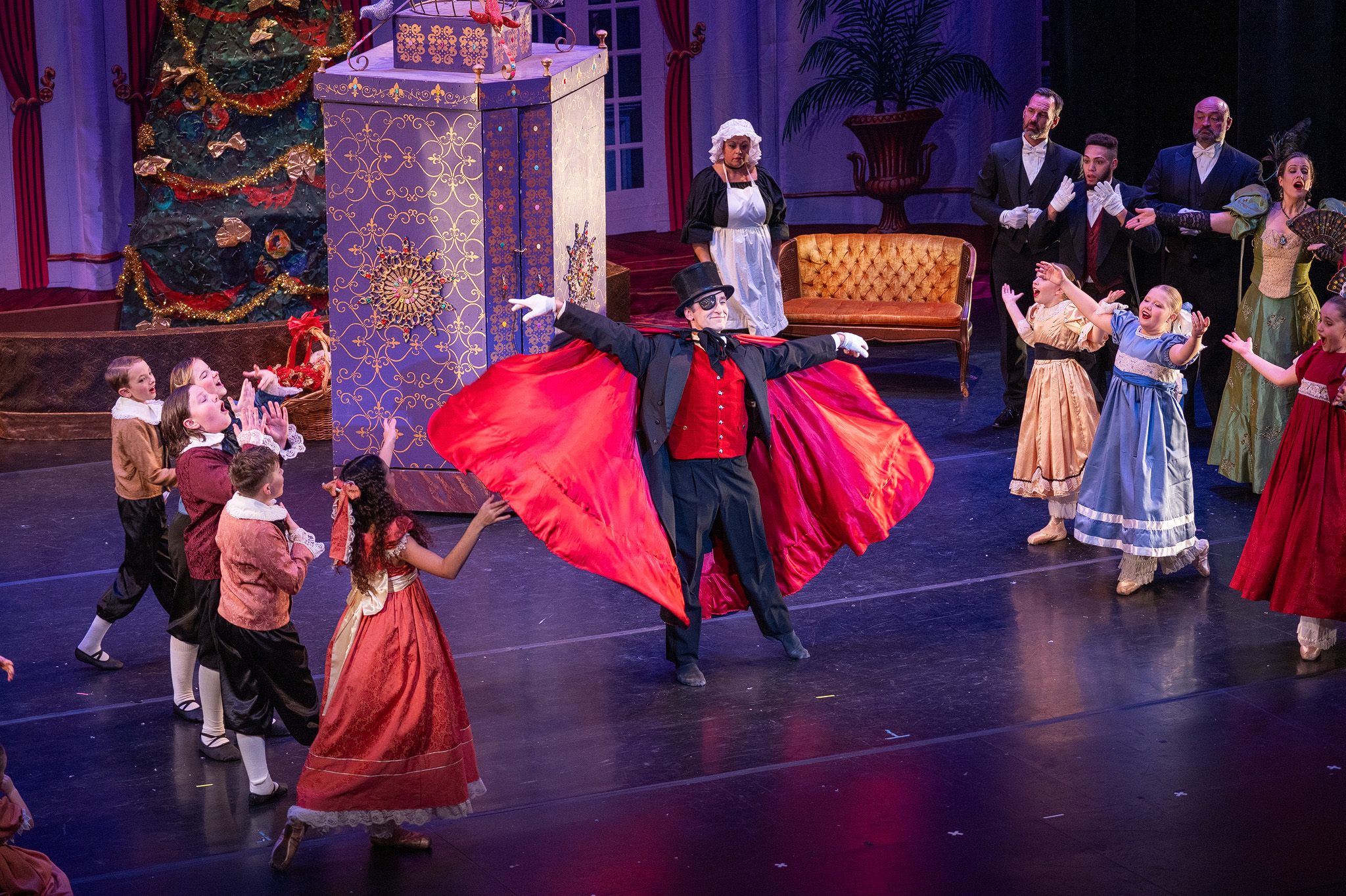 CRYB dancers performing a lively Nutcracker party scene